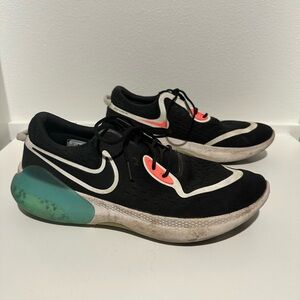 Nike Black and Teal Running Shoes with Red Accents